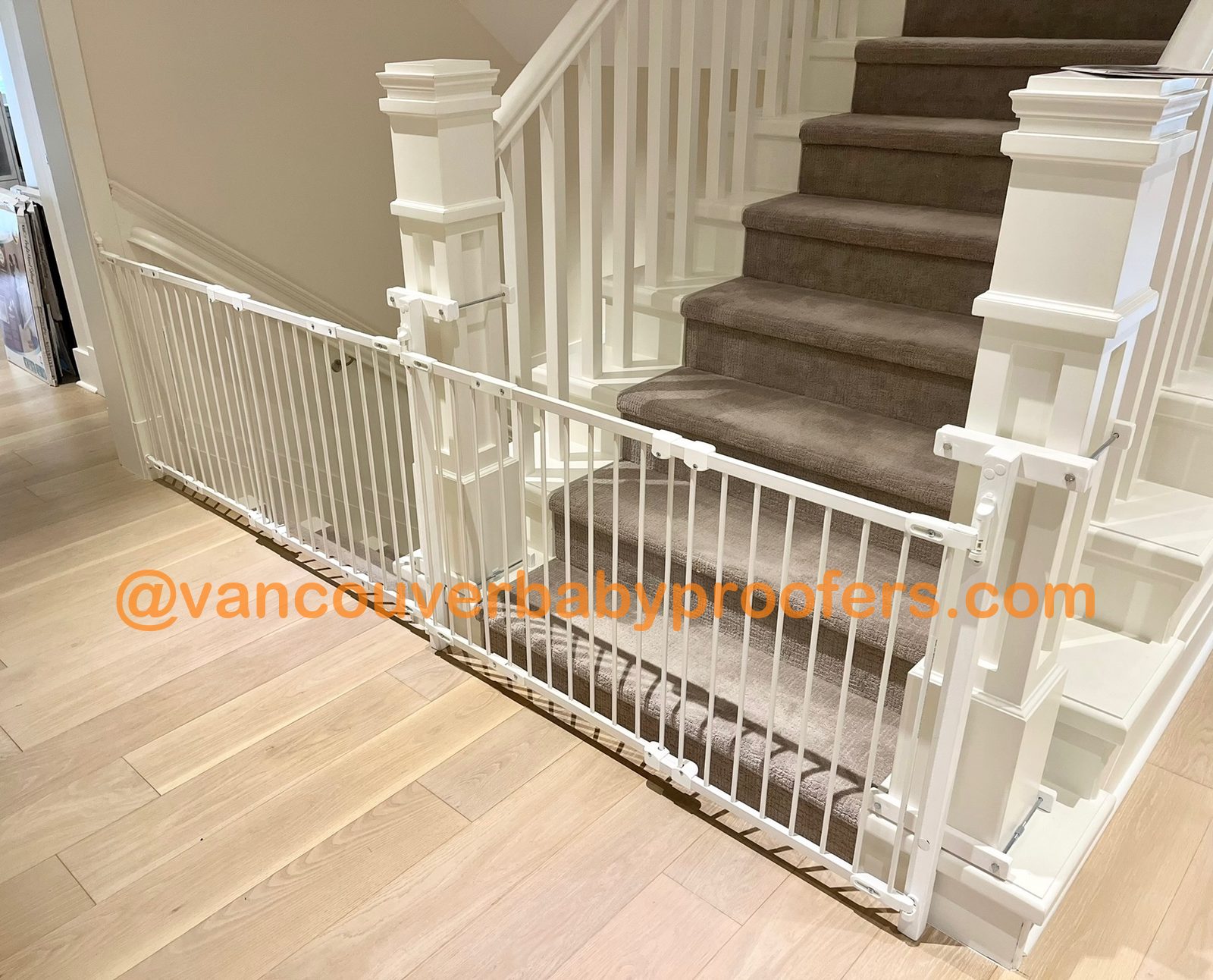 Wood banisters, no-hole clamps installation by Vancouver Baby Proofers