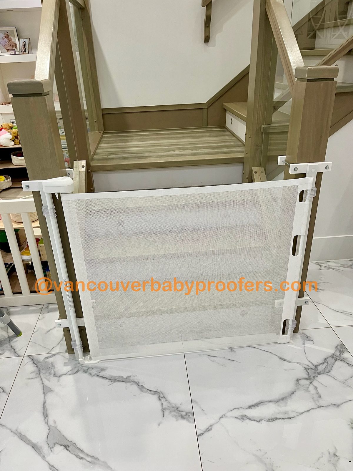 Wood banisters, no-hole clamps installation by Vancouver Baby Proofers