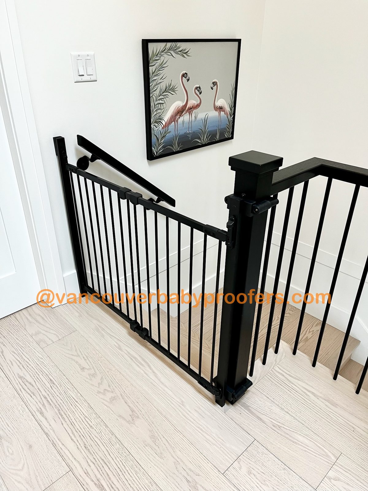 Wood banisters, no-hole clamps installation by Vancouver Baby Proofers