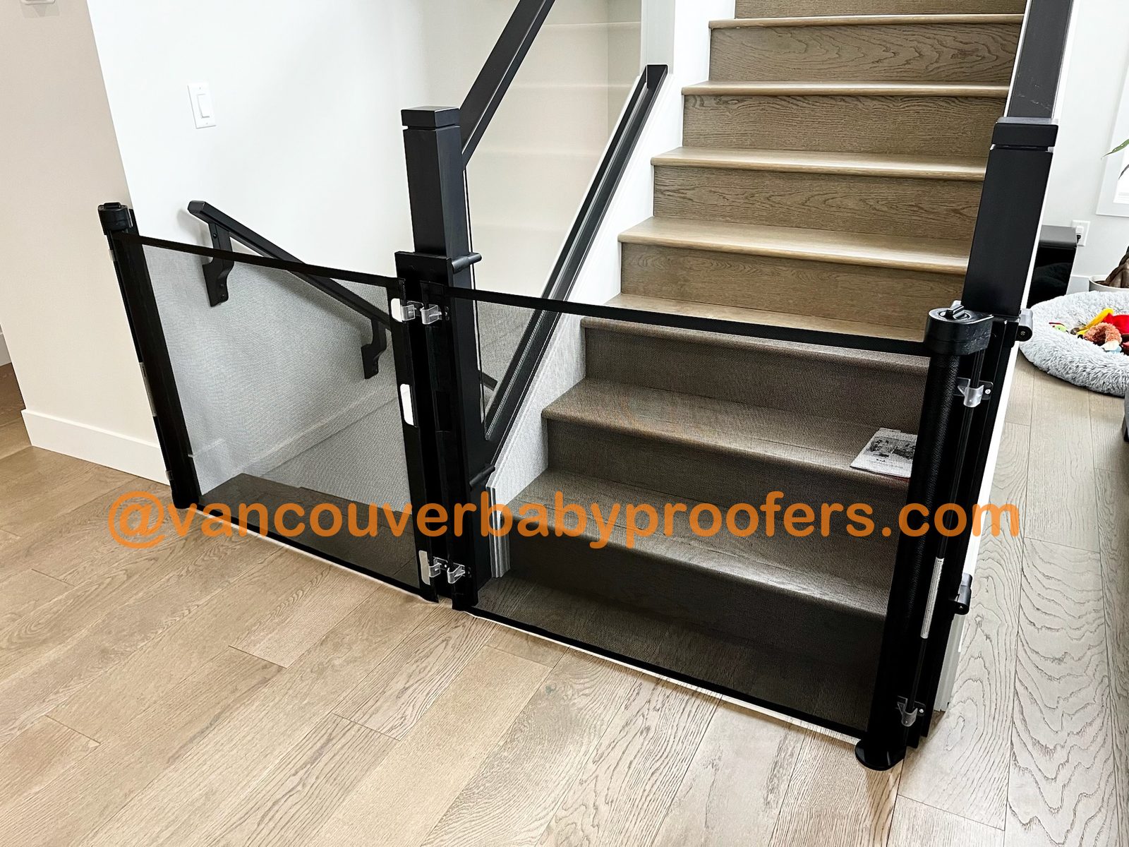Wood banisters, no-hole clamps installation by Vancouver Baby Proofers