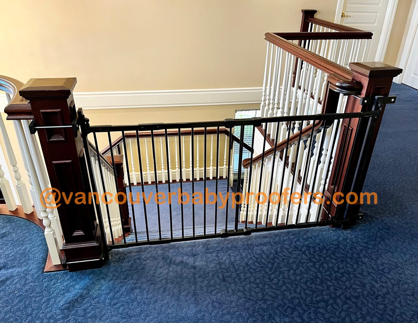 Wood banisters, no-hole clamps installation by Vancouver Baby Proofers