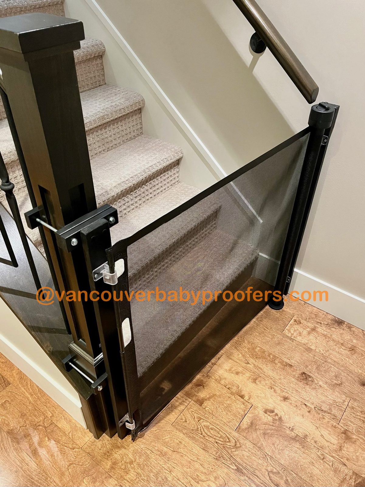 Wood banisters, no-hole clamps installation by Vancouver Baby Proofers