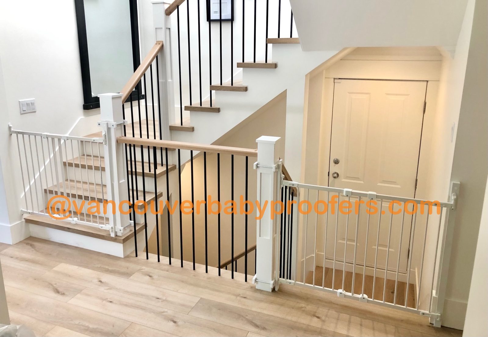 Wood banisters, no-hole clamps installation by Vancouver Baby Proofers