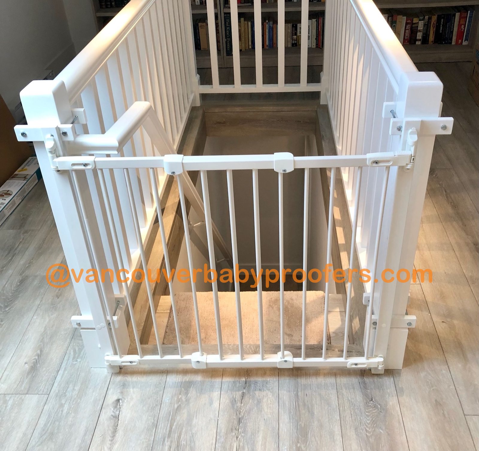 Wood banisters, no-hole clamps installation by Vancouver Baby Proofers