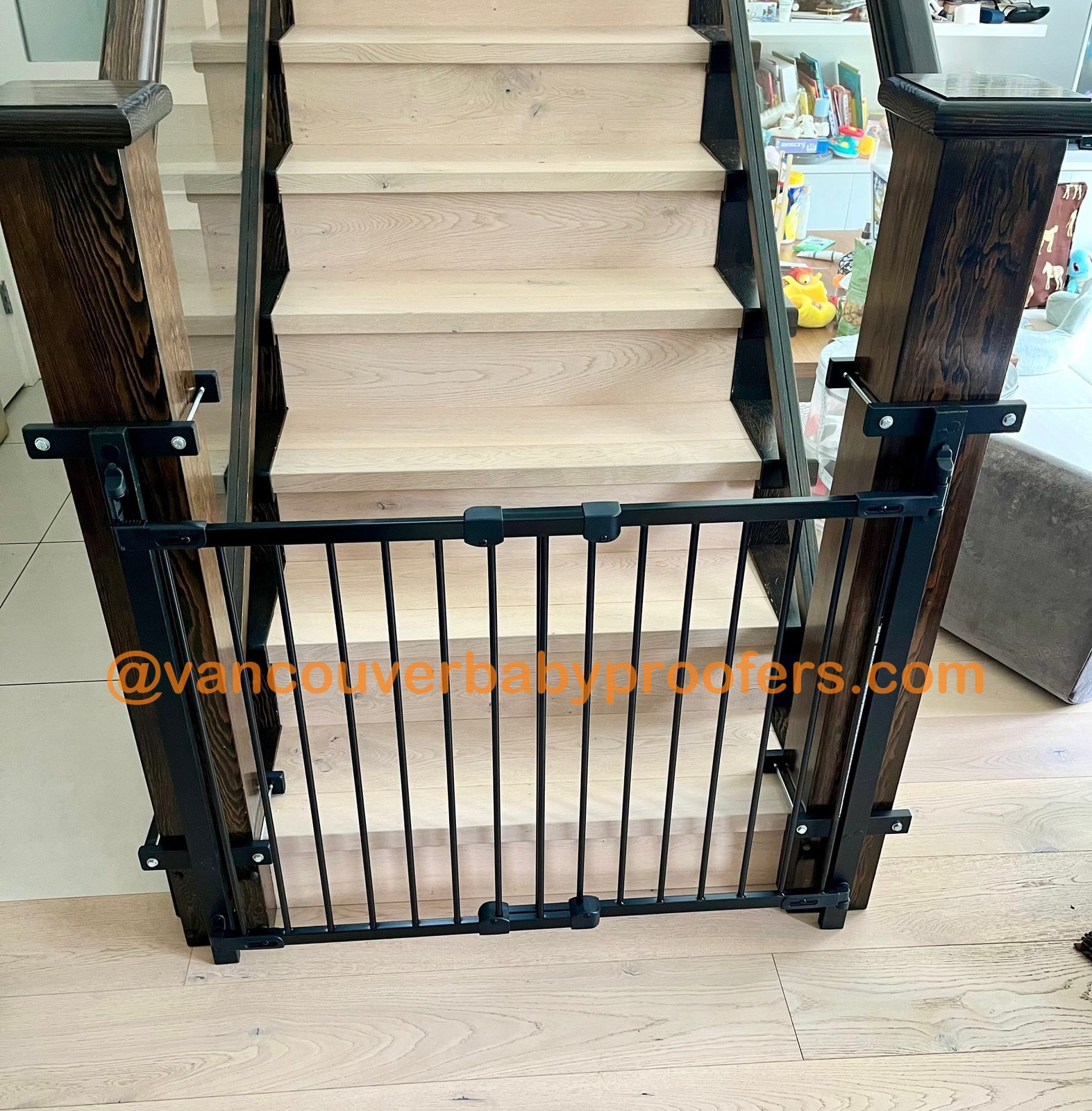 Wood banisters, no-hole clamps installation by Vancouver Baby Proofers