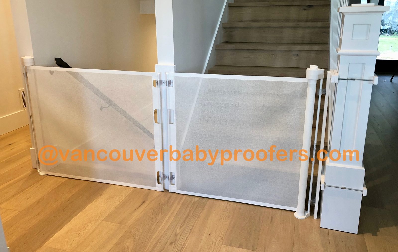 Wood banisters, no-hole clamps installation by Vancouver Baby Proofers